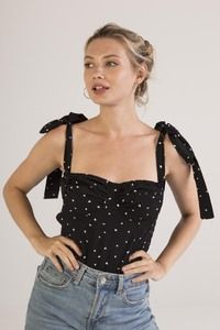 Strapless top with polka dots and bow on the straps